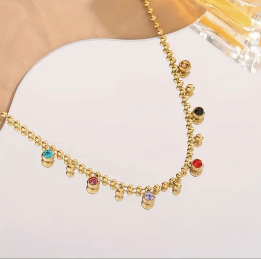 Colar dorado piedras colores