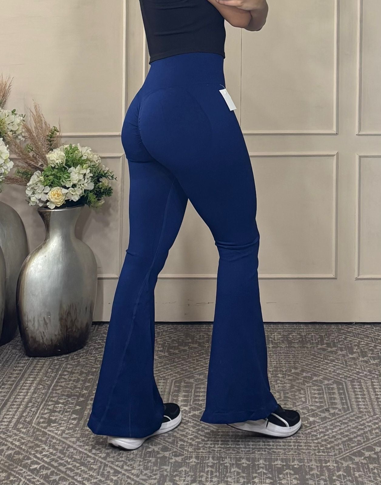 Legging deportivo acampanado