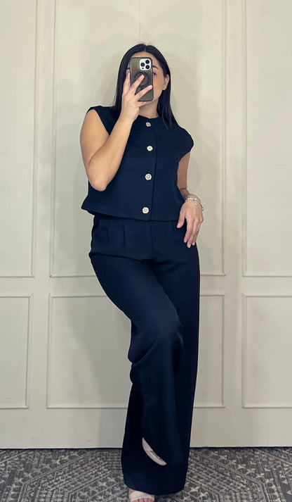 Conjunto pantalon y blusa chaleco